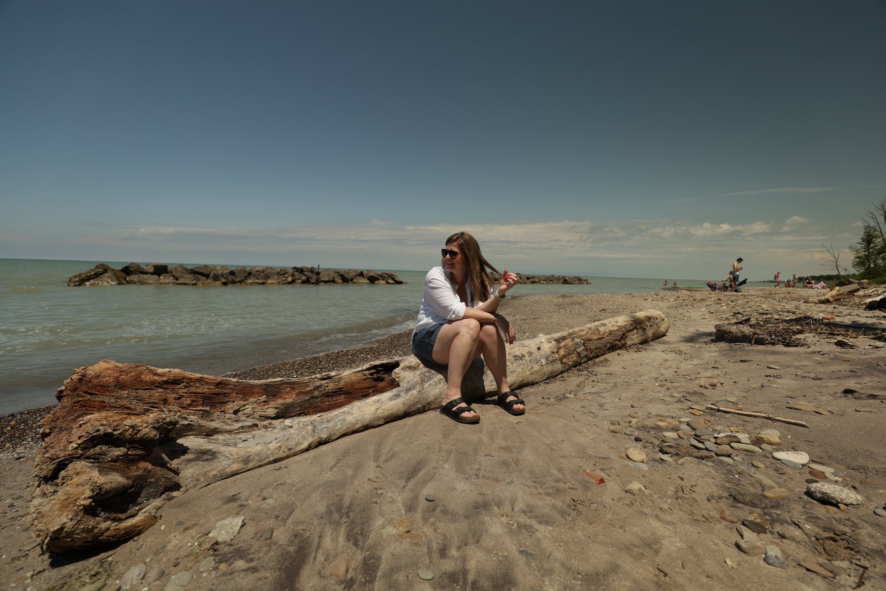 Relaxed portrait moment on a rocky Lake Erie beach.