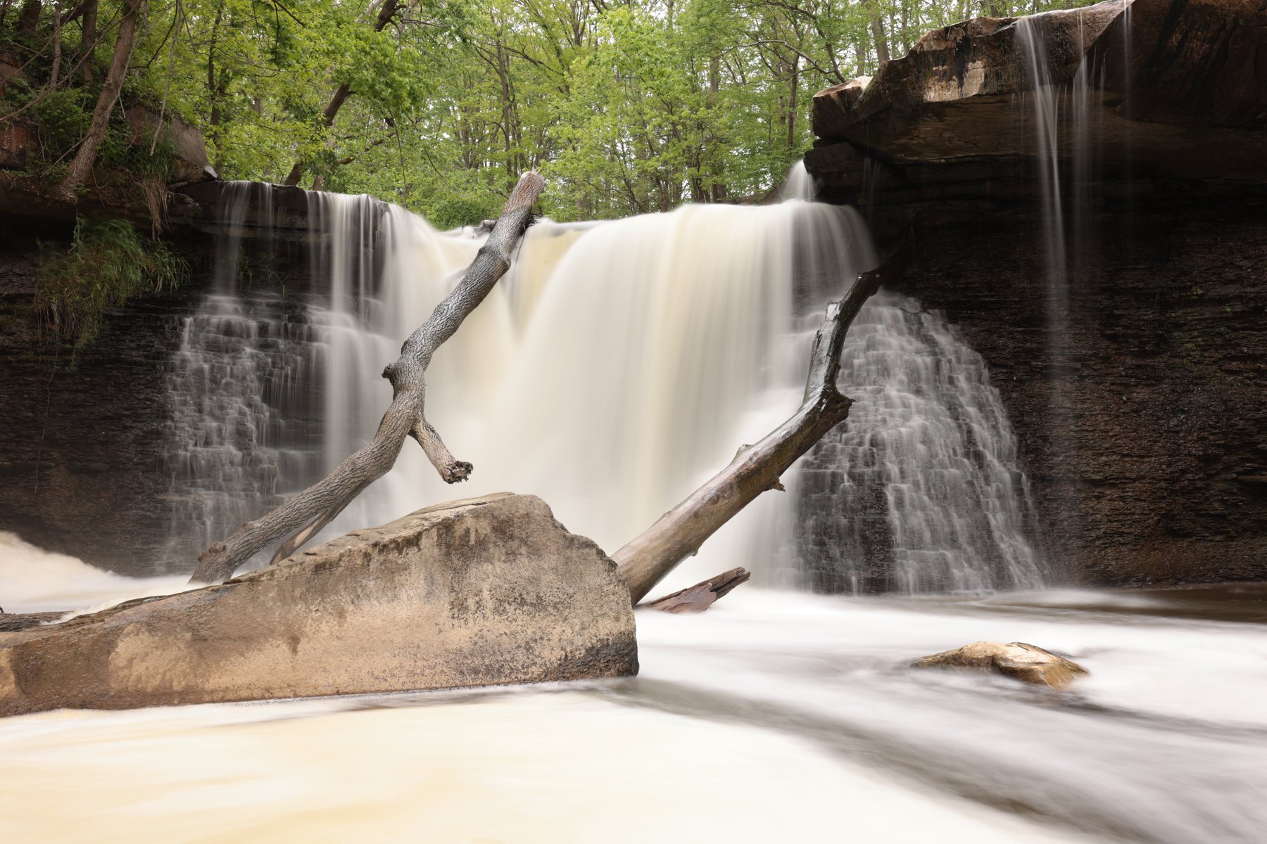 Smooth long-exposure waterfall scene.